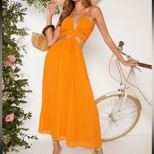 Orange Cut Out Waist Tie Backless Pleated Hem Halter Dress